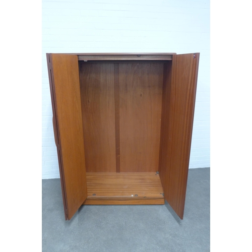 268 - G-Plan vintage teak bedroom suite comprising a wardrobe,  122 x 77 x 58cm, chest of drawers (a/f) an... 