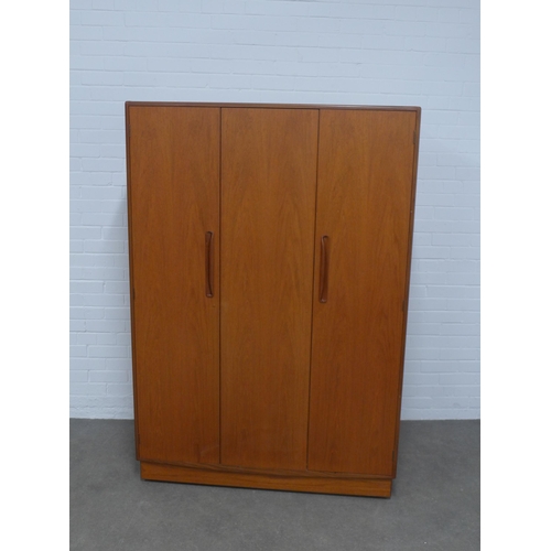 268 - G-Plan vintage teak bedroom suite comprising a wardrobe,  122 x 77 x 58cm, chest of drawers (a/f) an... 