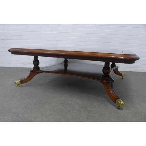 283 - Large mahogany coffee table with star motif and undertier, 122 x 43cm.