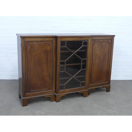 285 - Mahogany breakfront cabinet, with central astragal glazed door flanked by panelled doors, 152 x 100 ... 