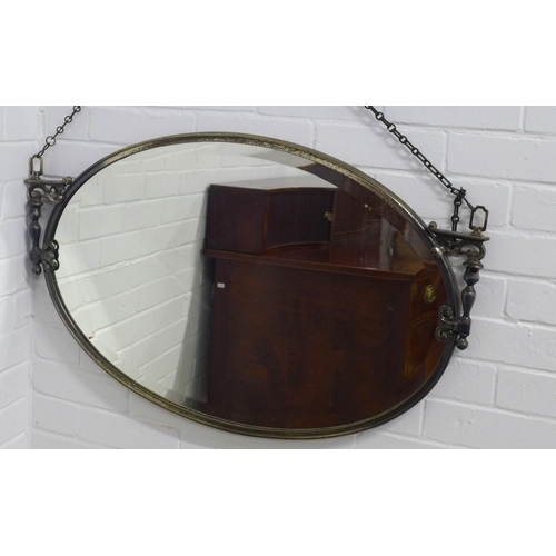 290 - Early 20th century oval wall hanging mirror, 86 x 54cm.