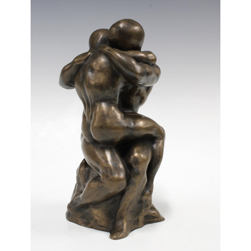 316 - Modern bronze patinated embracing figure group, after The Kiss, 25cm