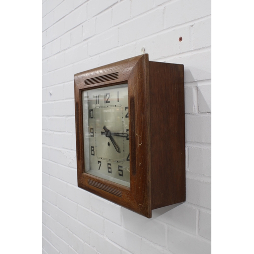 318 - Art Deco wall clock with square silvered dial and arabic numerals, 37 x 37cm