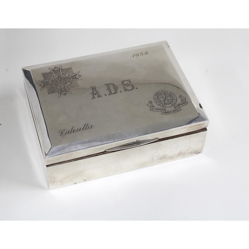 32 - George V silver cigarette box, the lid  inscribed with initials, Calcutta and 1935, together with cr... 