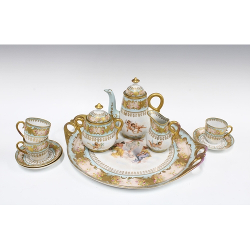 320 - Sevres style tete a tete service with tray, decorated with cherubs, teapot 18cm, tray a/f (10)