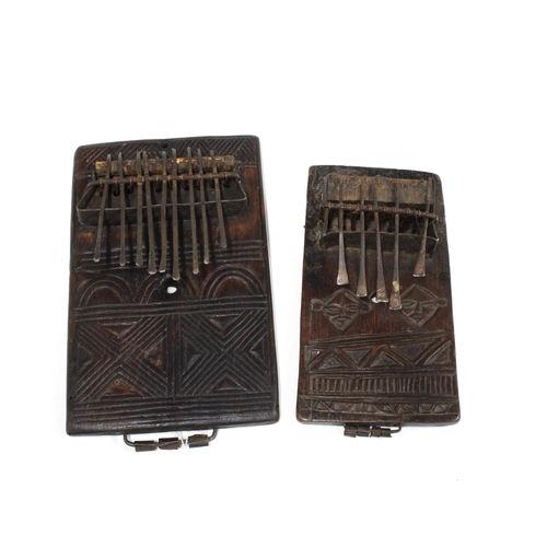 330 - Two Chokwe metal Sansa thumb pianos, with carved wooden backplates and metal keys, larger 23 x 14cm ... 