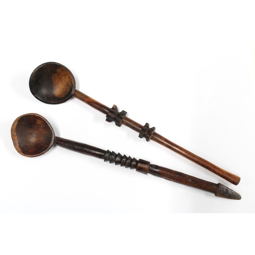 335 - ZULU wooden spoons, one with an arrowhead terminal, 33cm (2)