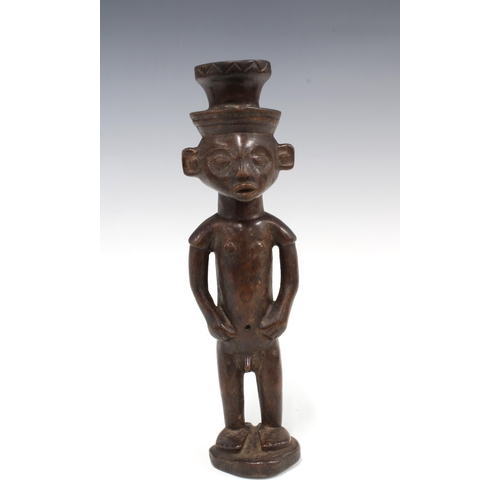 337 - OVIMBUNDU, a front and back carved male figure, 31cm