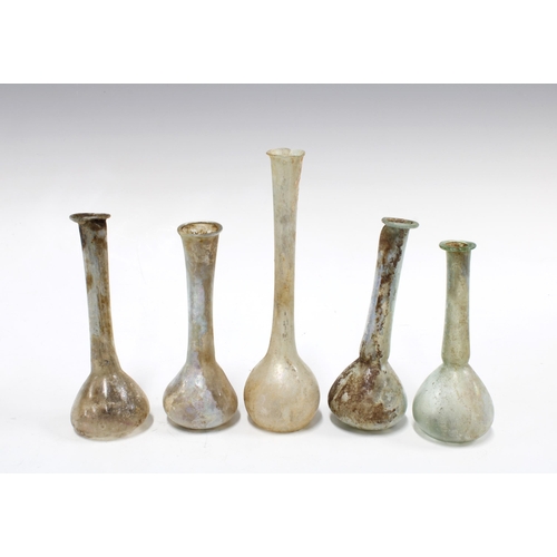 343 - A collection of five Roman glass perfume bottles, CA 3rd century AD,  tallest 17cm high (5)