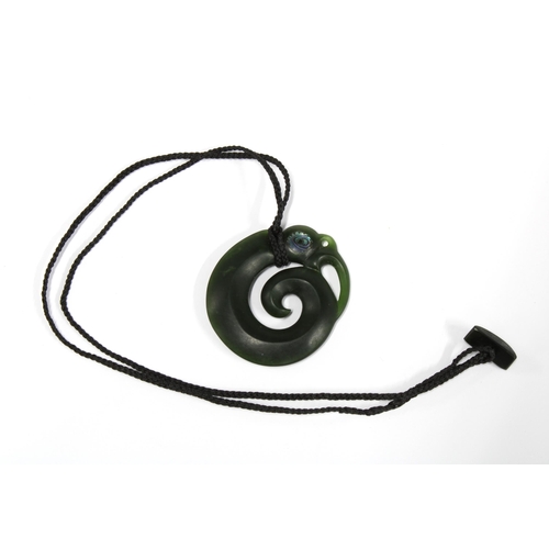 350 - A New Zealand Maori Pounamu greenstone 'Manaia' with paua abalone eye. Messenger and spiritual kaiti... 