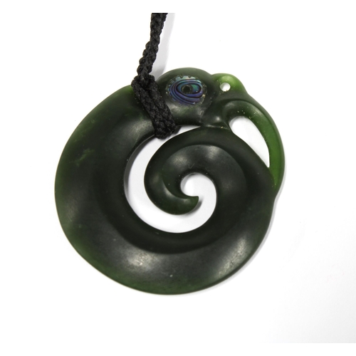 350 - A New Zealand Maori Pounamu greenstone 'Manaia' with paua abalone eye. Messenger and spiritual kaiti... 