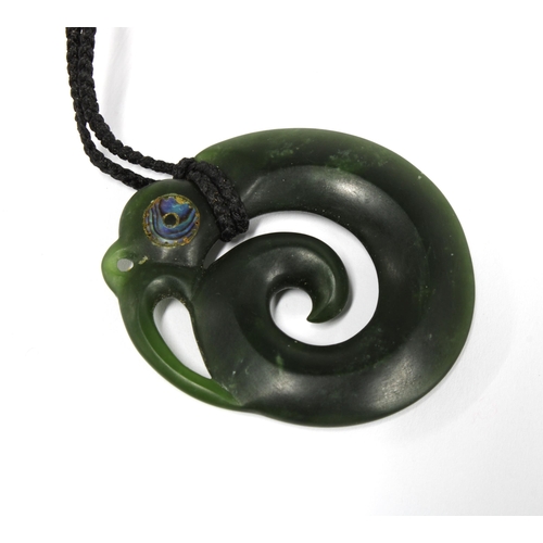 350 - A New Zealand Maori Pounamu greenstone 'Manaia' with paua abalone eye. Messenger and spiritual kaiti... 