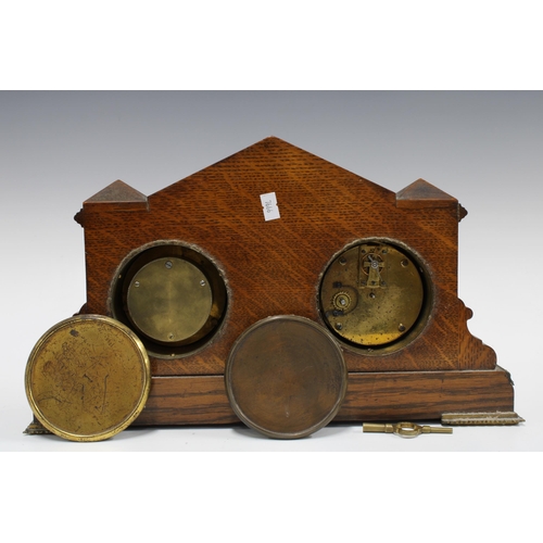 371 - An Edwardian oak cased combination clock, barometer and thermometer, 40 x 24cm