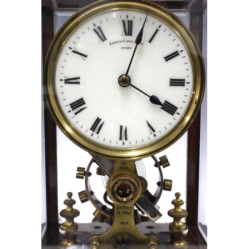 383 - Eureka Electric Mantel Clock, 1906, in a four panelled glass case, signed dial and numbered 8001, pa... 