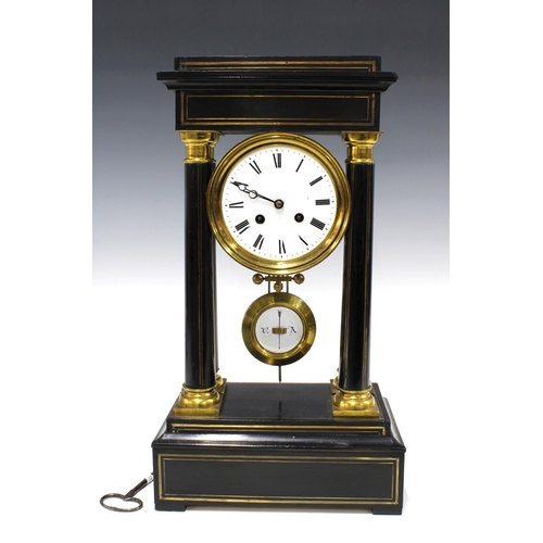 384 - French Empire column Portico mantle clock, ebonised case with ormolu, complete with pendulum and key