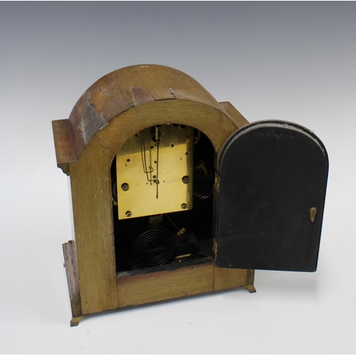 385 - American eight day mantle clock by William Gilbert Clock Company, (case with losses to veneer)