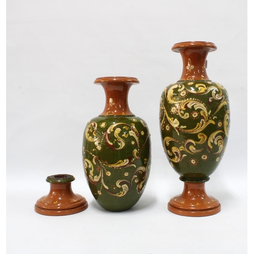 400 - EXETER ART POTTERY, pair of green glazed terracotta vases, with floral pattern, on socle bases, with... 