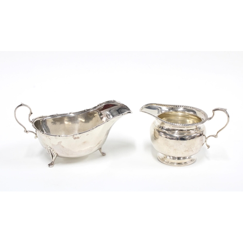 41 - Sheffield silver sauceboat and a London silver cream jug (2)