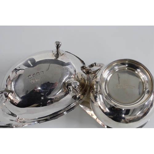 41 - Sheffield silver sauceboat and a London silver cream jug (2)