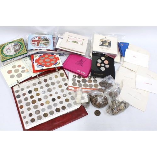 412 - A collection of UK Royal Mint coin sets and commemorative coins, mainly 1990's and a box with world ... 