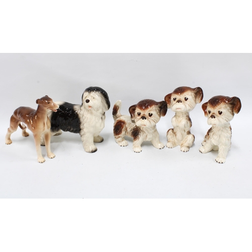 435 - A collection of Melba Pottery dogs (5)