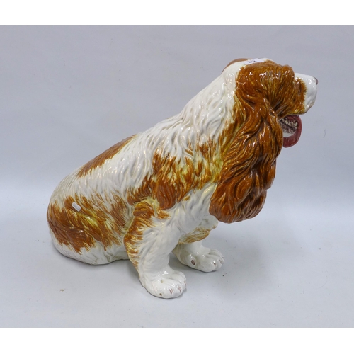 454 - A large fireside spaniel, glazed terracotta, approx 50cm tall