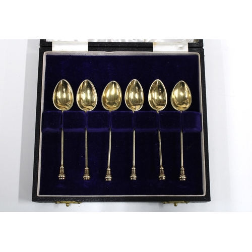 50 - Set of six silver gilt cased enamel coffee spoons, Barker Brothers, Birmingham 1957 (6)