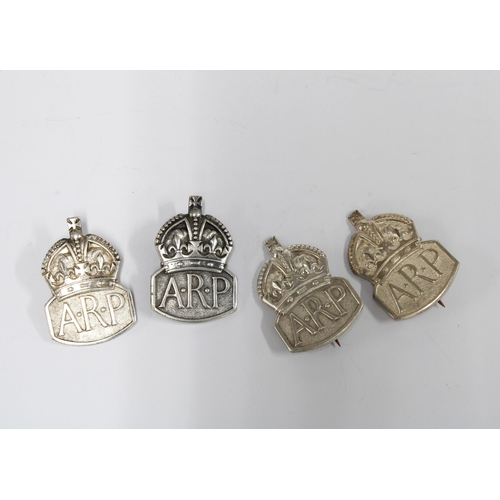 53 - Four WWII silver ARP Warden badges, Royal Mint, London 1938 / 39 (4)