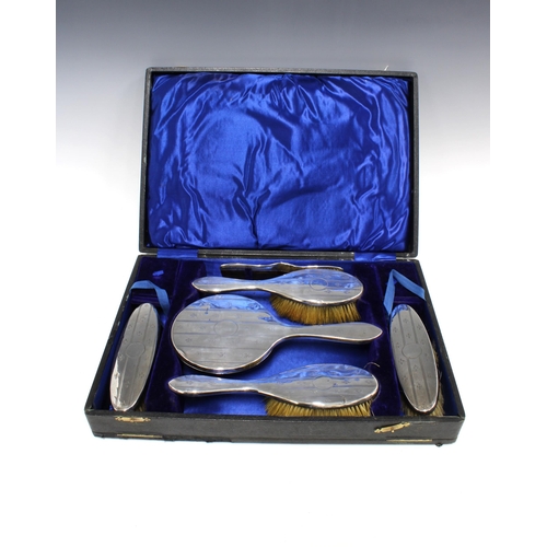 66 - George V silver dressing table brush set, seven parts, in fitted case, Birmingham 1917