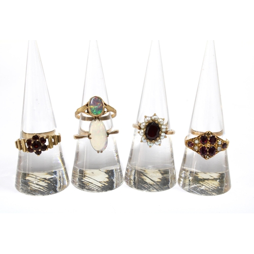 7 - Five 9ct gold gemset rings to include opal, garnets and pearls (5)