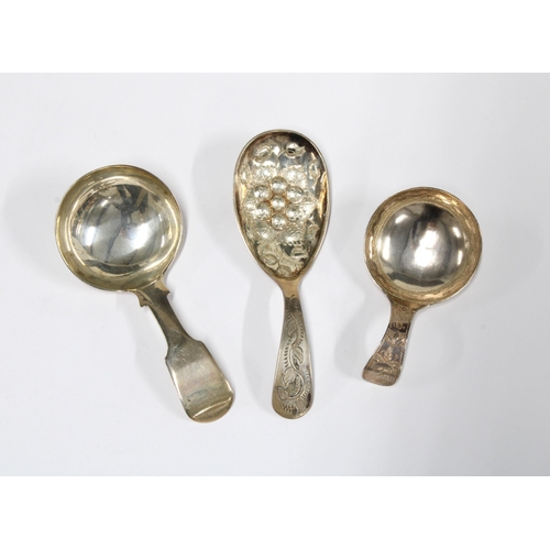 88 - A Georgian silver caddy spoon and two later silver caddy spoons, (3)