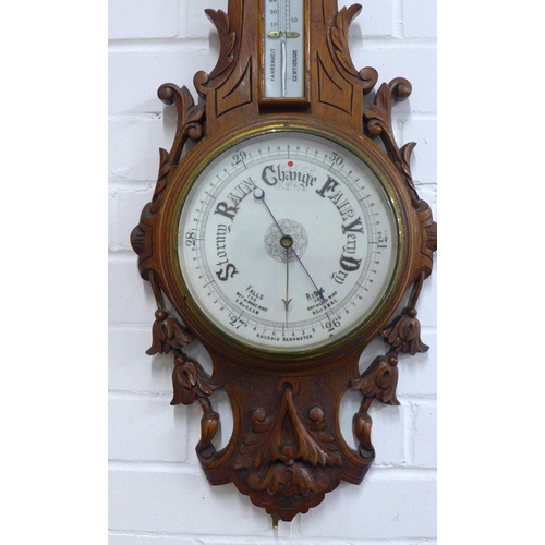 471 - Early 20th century oak aneroid wall barometer, 81cm