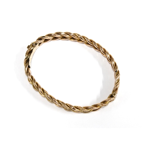 1 - 9ct gold bangle with interwoven links, stamped 9ct