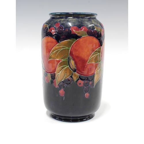 114 - Moorcroft Pomegranate tuble line decorated vase,  green facsimile signature and impressed marks, 21c... 