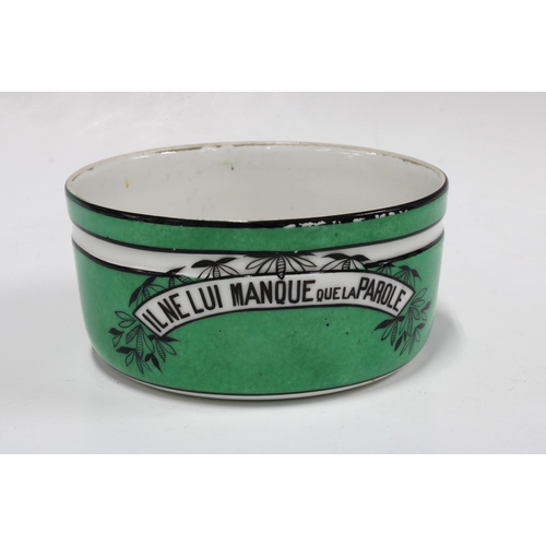 123 - Early 20th century French green glazed dogs bowl 'Il Ne Lui Manque que la Parole' signed underside i... 