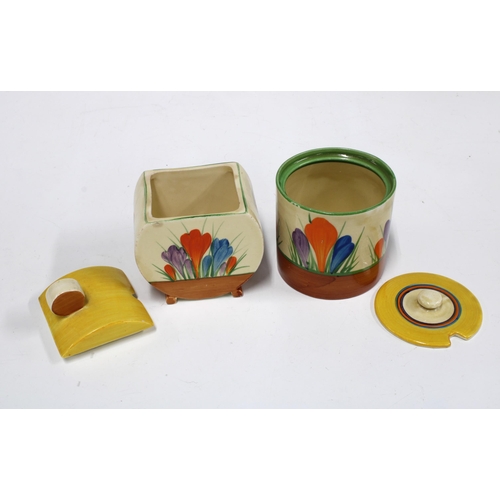 129 - Clarice Cliff  Bon Jour preserve pot and cover in Crocus pattern together with another of drum form,... 