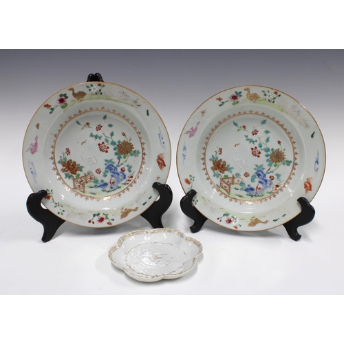 139 - Two 18th century Chinese famille rose plates, 13cm, together with a small Chinese scalloped dish (3)