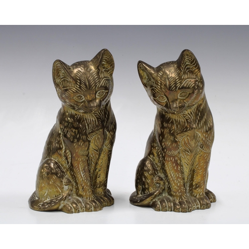 146 - Two brass cats, 18cm (2)