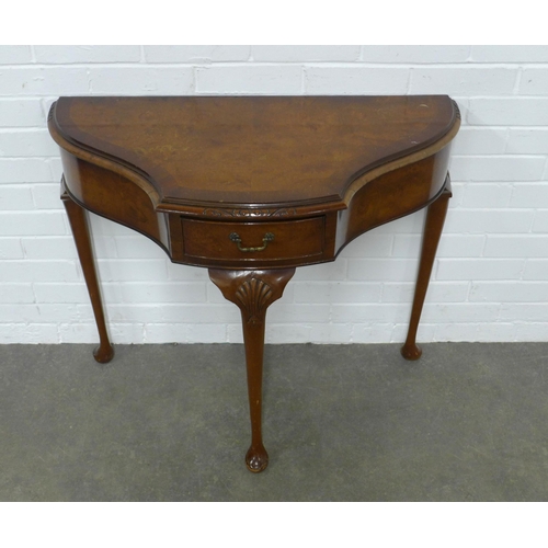 205 - Burr walnut console table, raised on three cabriole legs, 89 x 77 x 42cm.