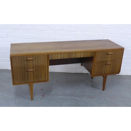 221 - A mid 20th century teak Beithcraft dressing table, 152 x 68 x 47cm