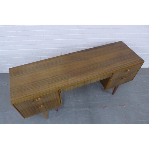 221 - A mid 20th century teak Beithcraft dressing table, 152 x 68 x 47cm