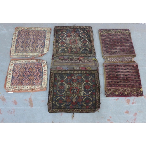 232 - Shahsevan saddlebags, larger 124 x 63cm, together with two smaller Persian saddlebag pieces (4)