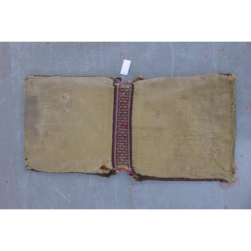 232 - Shahsevan saddlebags, larger 124 x 63cm, together with two smaller Persian saddlebag pieces (4)