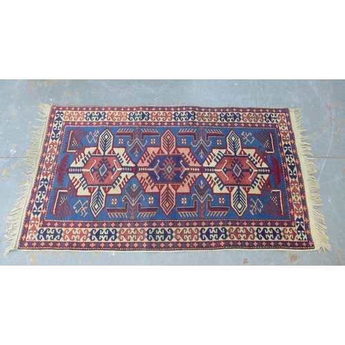 234 - Kazak style rug, blue and red field, 180 x 100cm