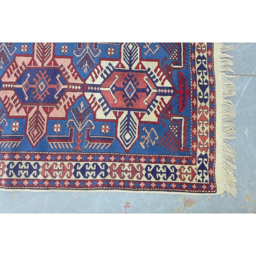 234 - Kazak style rug, blue and red field, 180 x 100cm