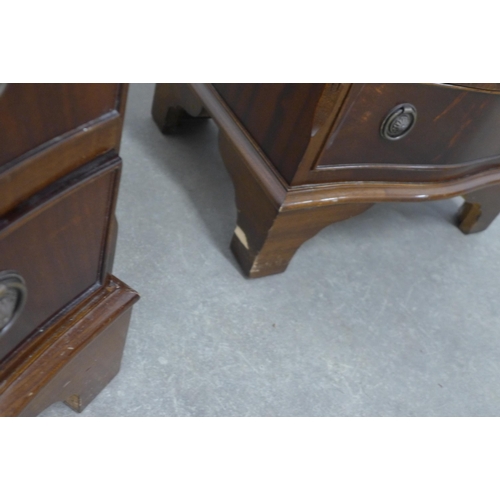 242 - Pair of mahogany serpentine bedside chests, 50 x 72 x 39cm. (2)