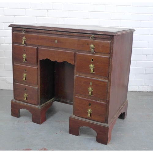 250 - Georgian mahogany kneehole desk, pull out slide over an arrangement of nine drawers, 89 x 80 x 53cm.