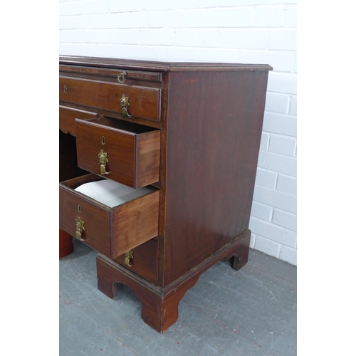 250 - Georgian mahogany kneehole desk, pull out slide over an arrangement of nine drawers, 89 x 80 x 53cm.