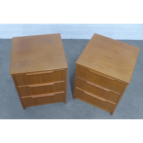 255 - Pair of teak three drawer bedside chests, 42 x 53 x 42cm. (2)