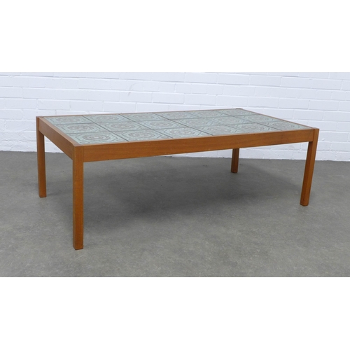 263 - A vintage teak and tiled top coffee table, 127 x 43 x 65cm.